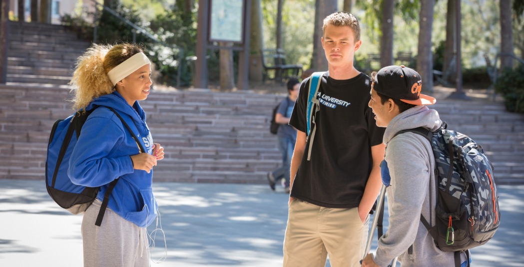 Three students talking