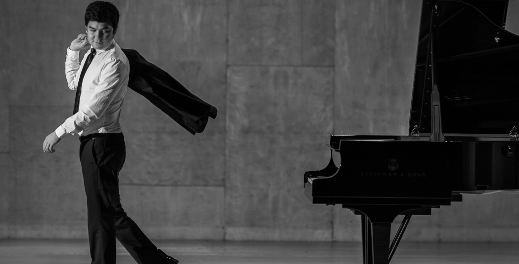 Bahzod Abduraimov walking away from piano