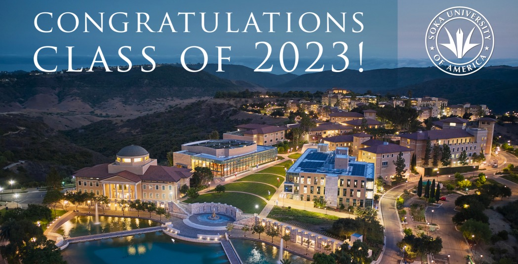 "Congratulations Class of 2023!" is written in white text overlayed on a drone aerial photo of Soka's campus at night with the Soka crest in the top right corner.
