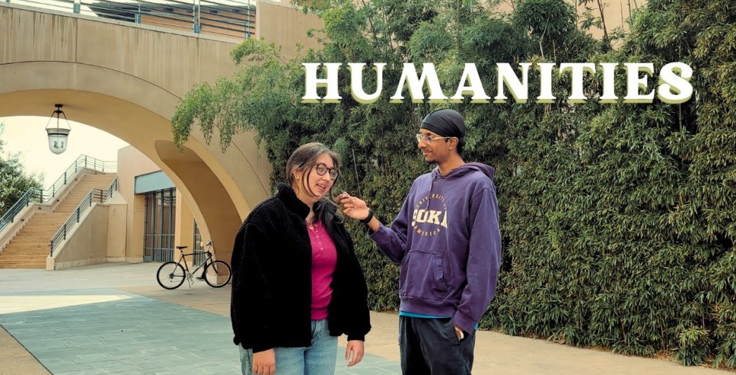 Humanities thumbnail showing two students talk on campus