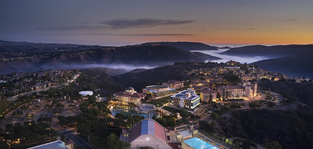 Aerial drone shot of SUA's campus during dusk