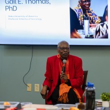 Gail Thomas, professor emerita of sociology, speaks during the community dialogue portion of MLK Week