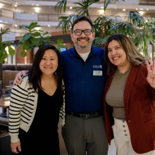 SUA’s Associate Director of Admissions Jimmy King poses with Ruby Nagashima and a College Night presenter