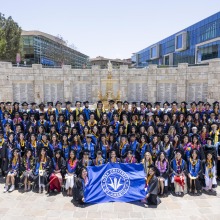 The Class of 2025 pose together for a commemorative photo during Commencement Day 2025