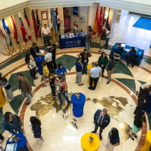 High-angle shot of people chatting on Founders Hall's 1st floor