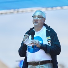 President Ed Feasel addresses the crowd during the festival
