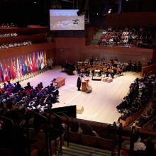 A wideshot of commencement inside the Performing Arts Center