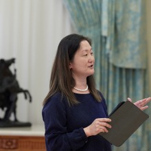 A participant speaks during the symposium