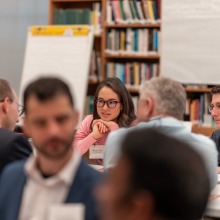 Attendees participate in a group discussion