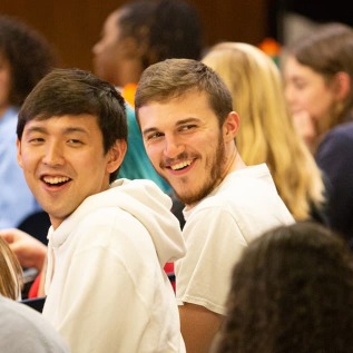 Students smiling during campus event