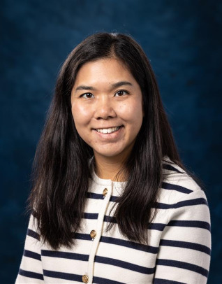 a head shot of professor yanyan luo on dark navy background