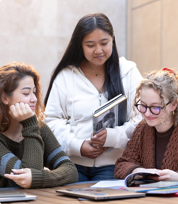 Students looking at books