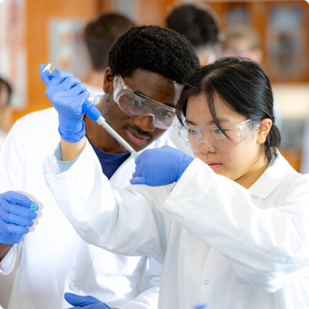 Two students working in a lab
