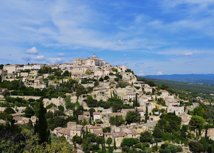 Mountain covered in buildings in France