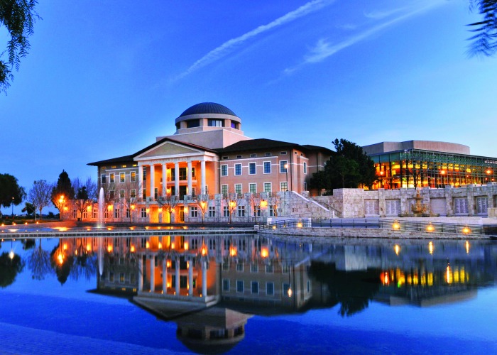 Founders Hall and Peace Lake calm and blue