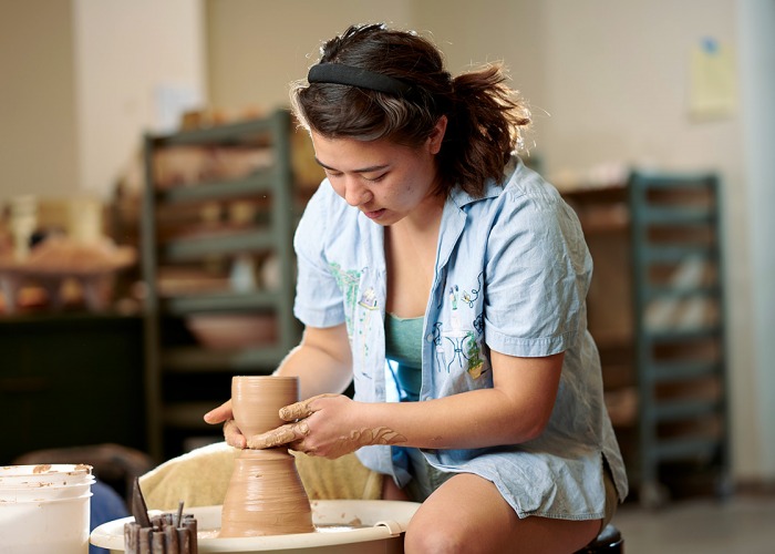 Katelynn Jankowiak at the potters wheel