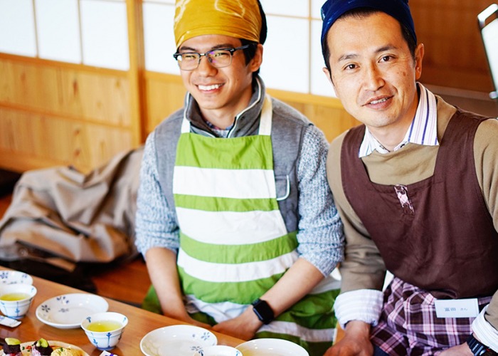 Student and professor at dining table