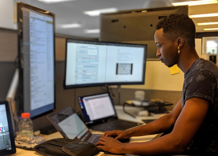 Man at his computer workstation