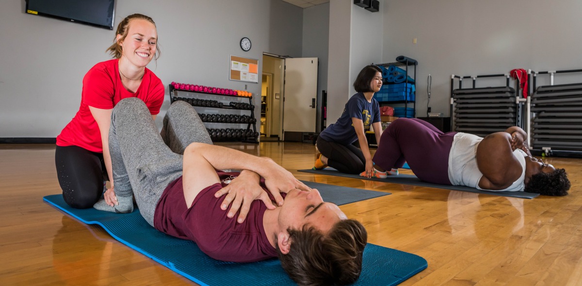 Image of students doing exercises in health class.