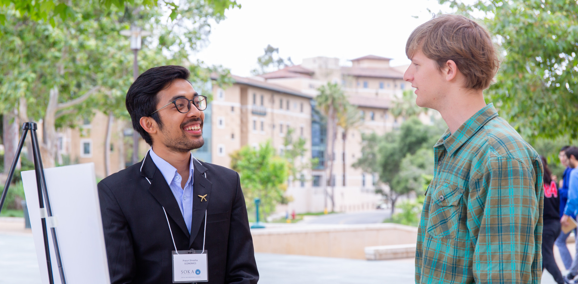Image of students at poster session.