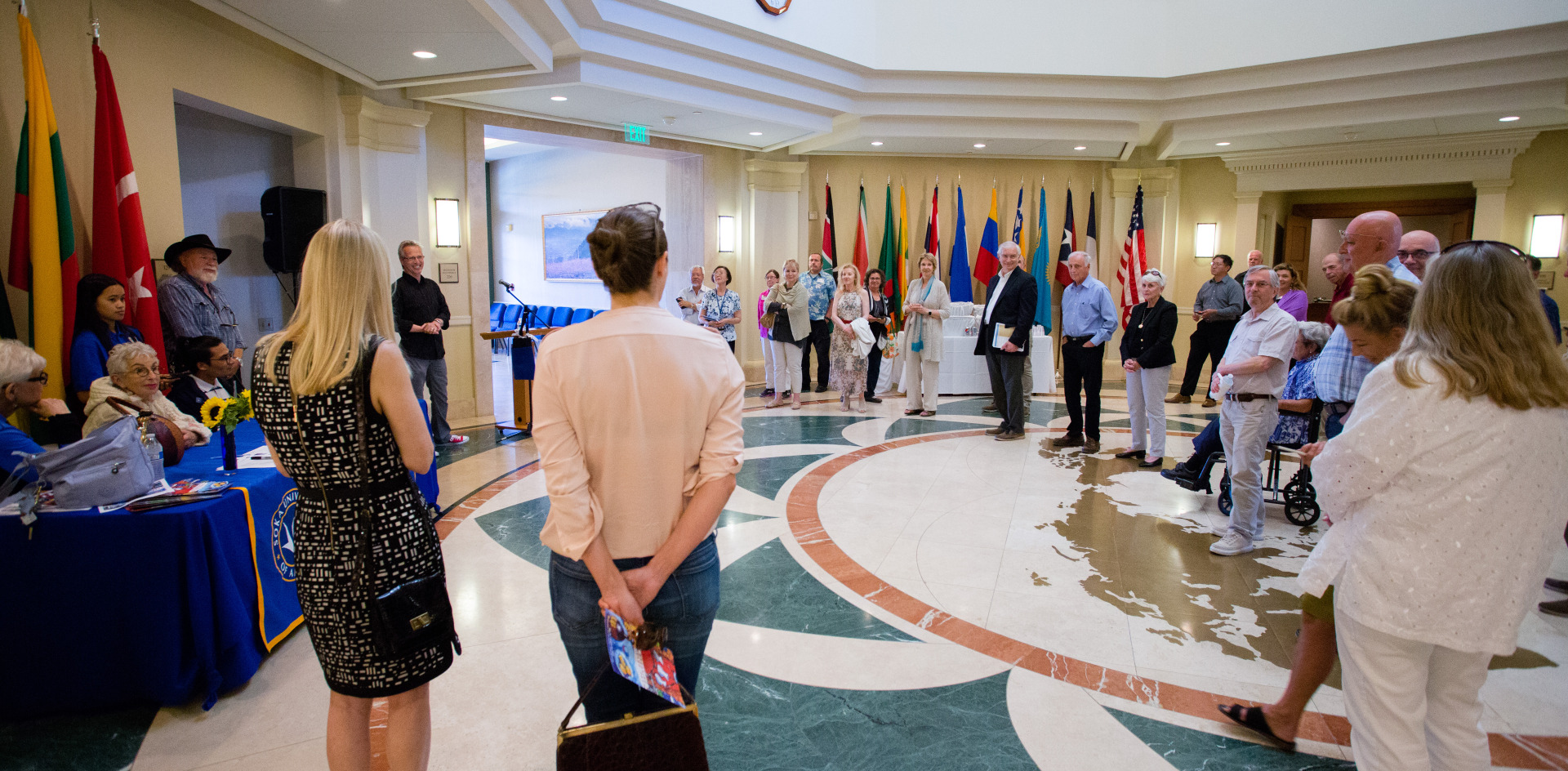 Image of people congregated in the atrium.