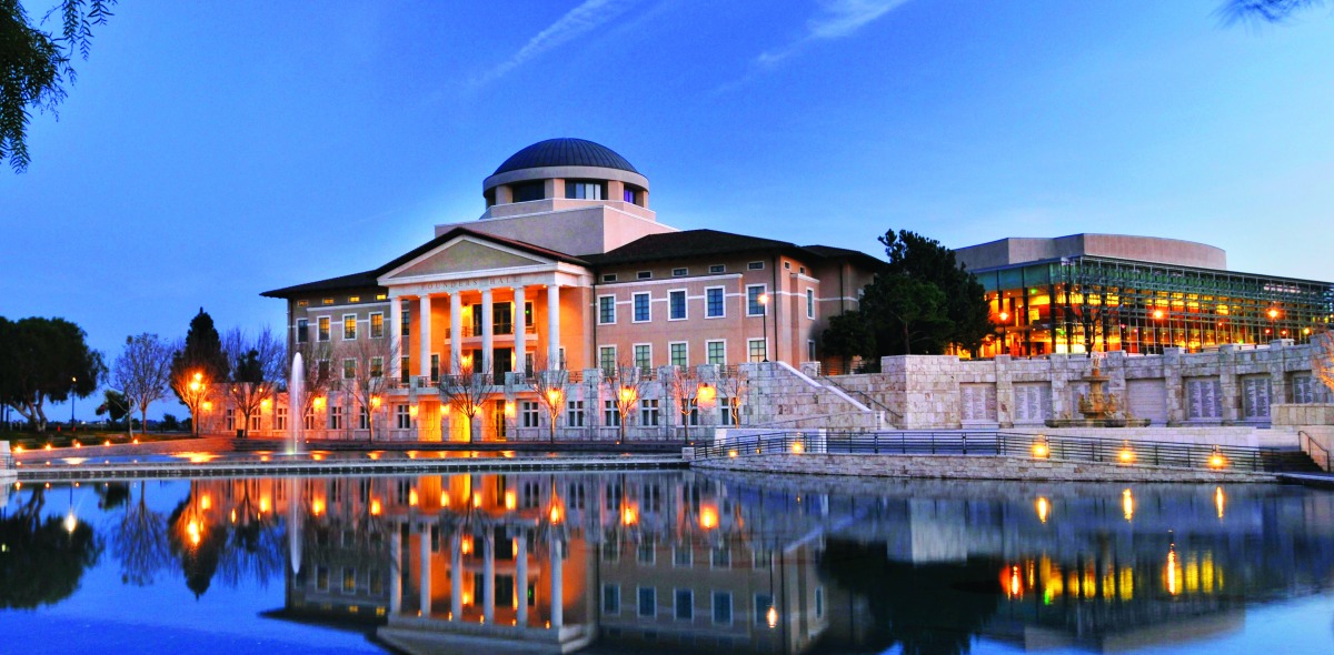 Founders Hall and Peace Lake calm and blue