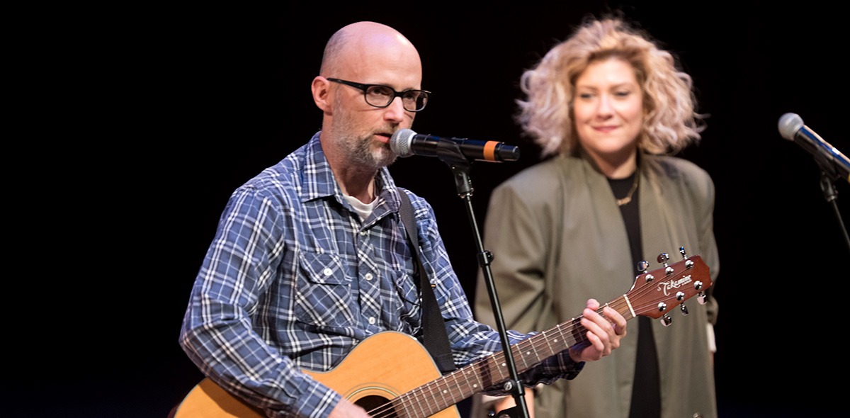 Moby performs with background singer