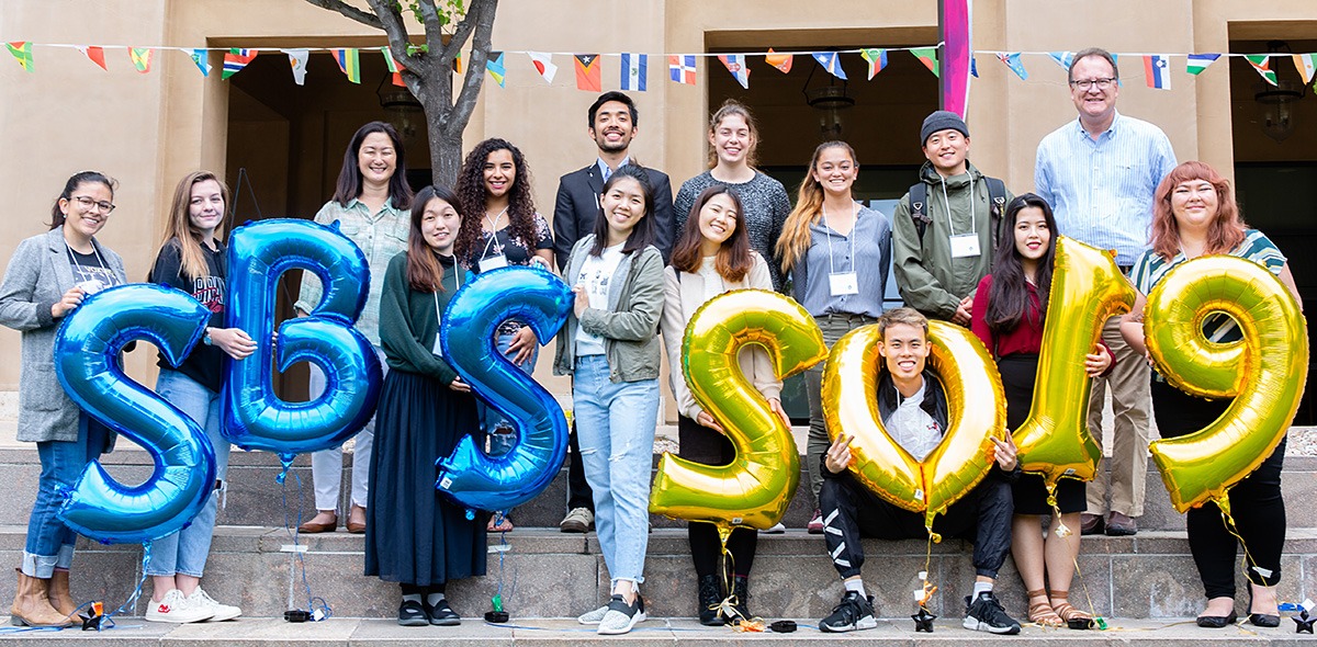 Large group of SBS students posing with 2019 balloons