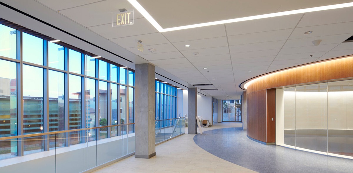 Inside Curie Hall, which features expansive hallways and large windows with views of campus