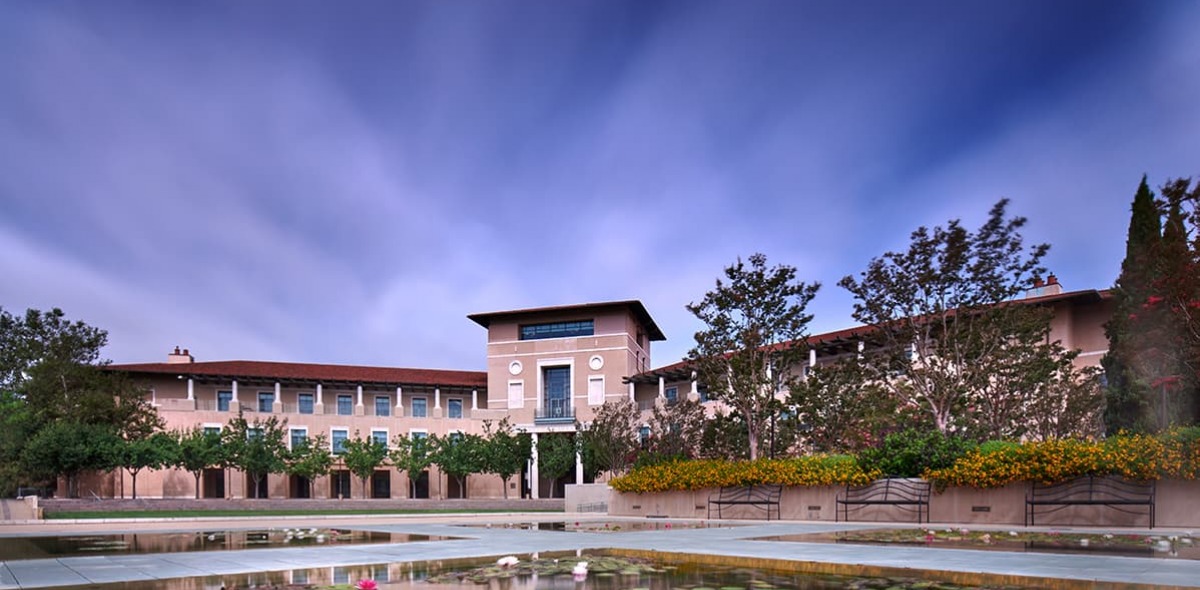 View of Ikeda Library with lily pond in the foreground