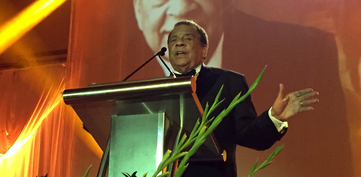 Andrew Young speaks at a podium