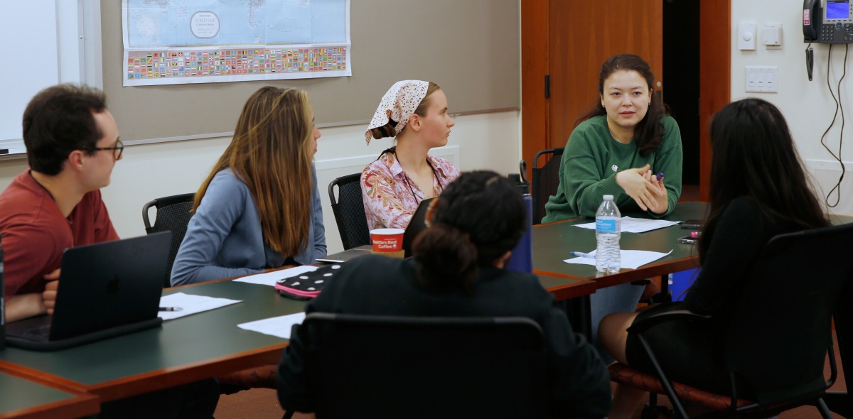 Students sit in discussion during a SIGS conference