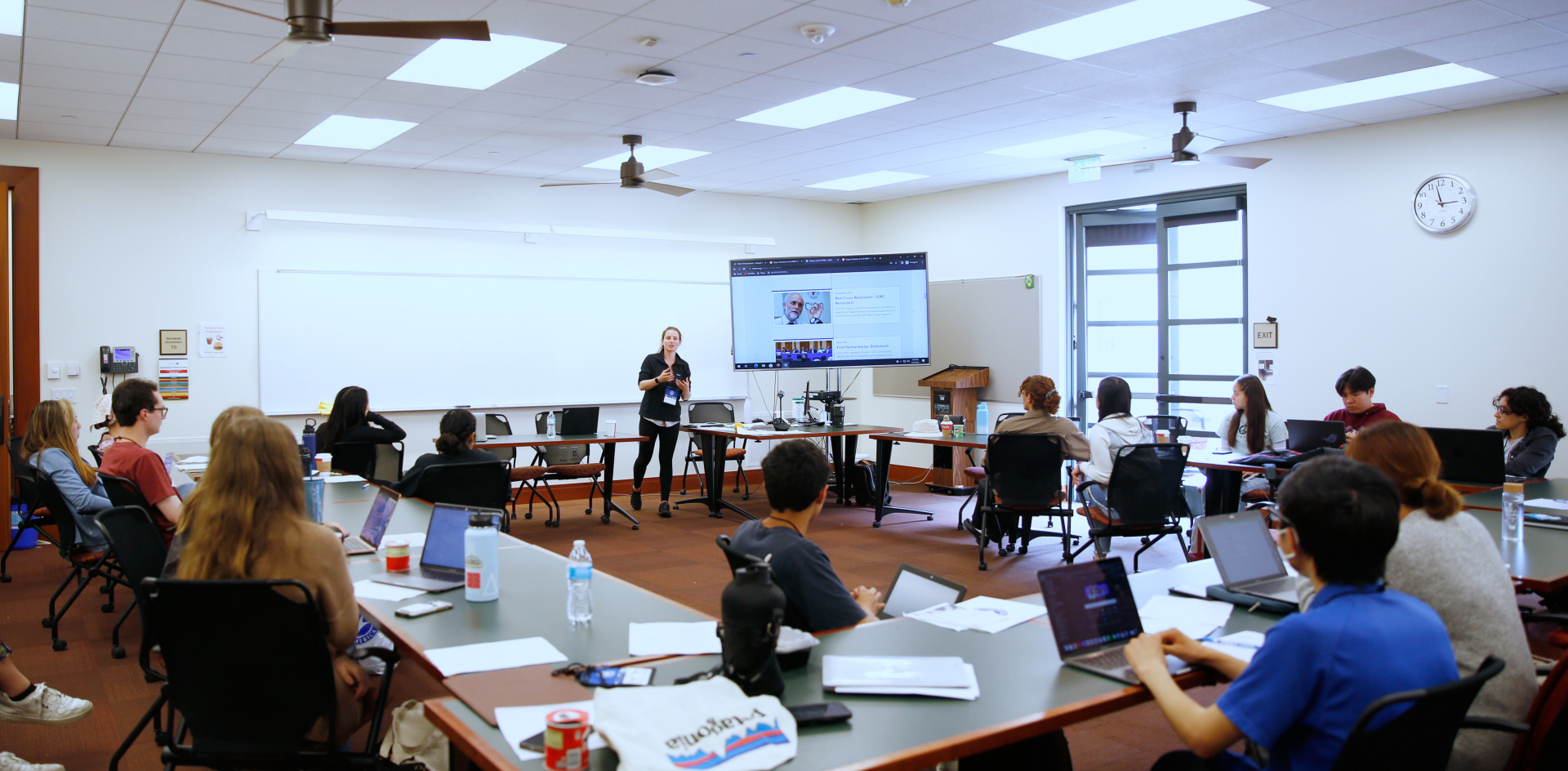 SIGS Summer Program participants sit in a classroom during a seminar