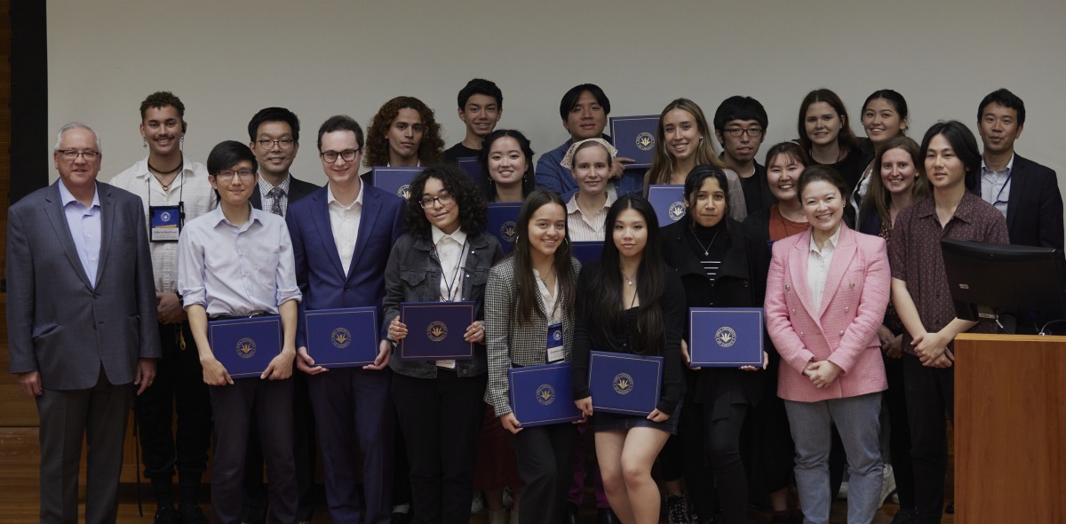 Members of SIGS pose with President Feasel for a photo