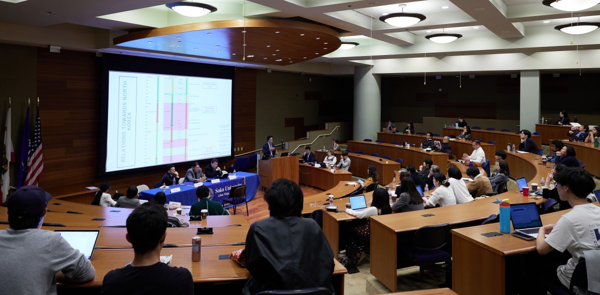 Participants of the SIGS Symposium listen intently to the panel of speakers in Pauling 216