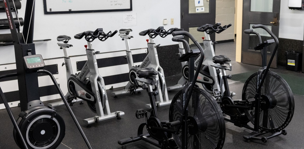 Exercise bikes are pictured in one of the SUA weightrooms