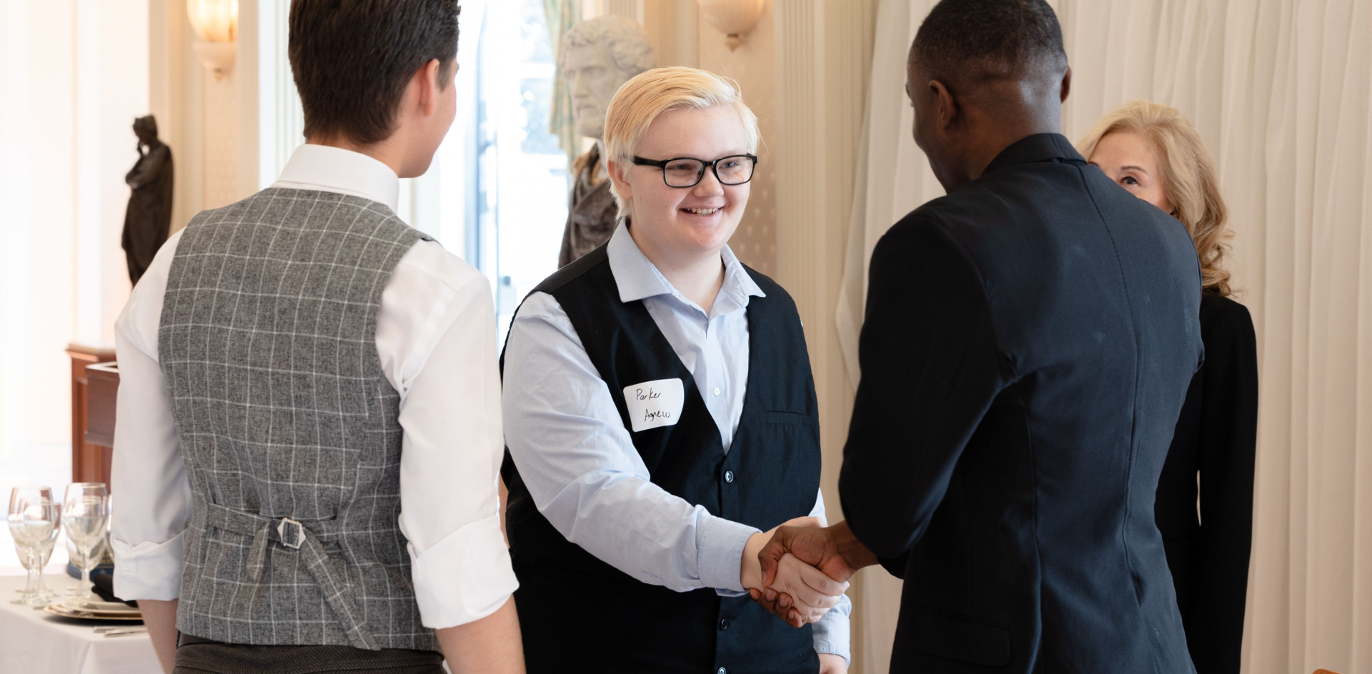 Students shaking hands