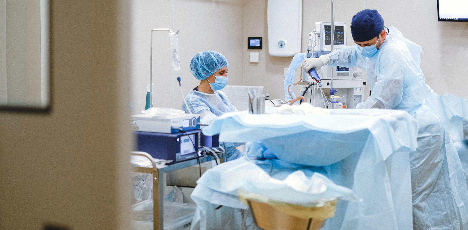 PA assisting surgeons in the operating room conducting a surgical procedure