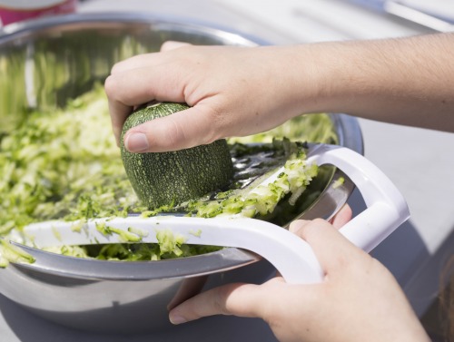 Student cleaning vegetables