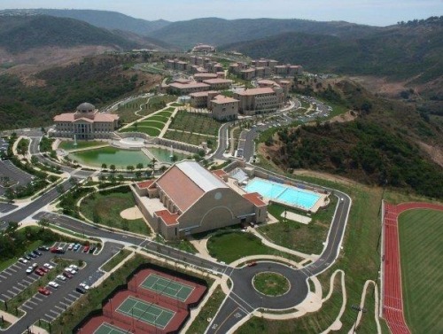 Aerial image of the Recreation Center, pool, tennis courts, and track.