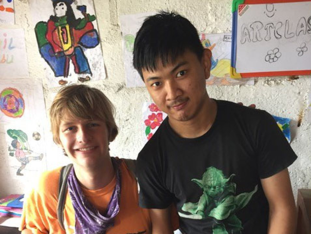 A student on an internship with a coworker.