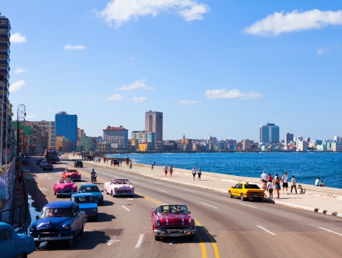 Image of a Havana street overlooking the ocean.