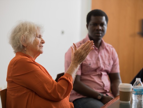 Deborah Meier talking with people