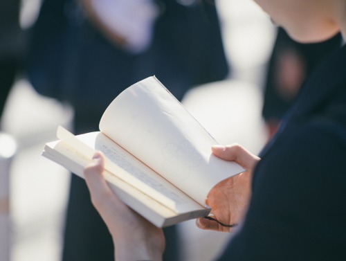 Image of person reading book