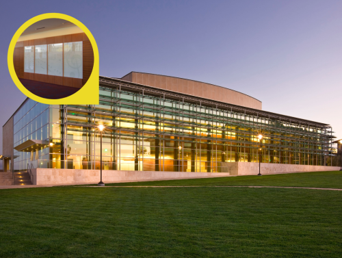 Exterior of Soka Performing Arts Center with inset of glass panel engravings