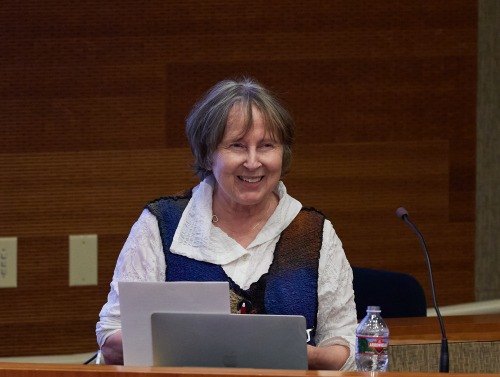 Roxann Prazniak speaks during the symposium