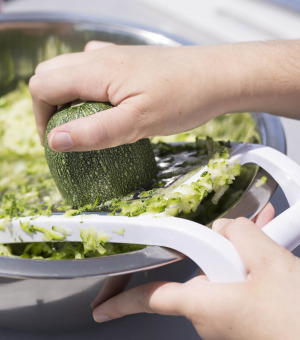 Student cleaning vegetables