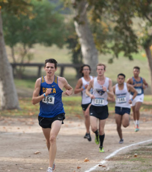 A Soka Cross Country team member is leading the pack in a race