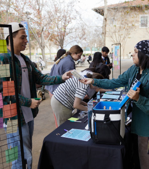 Students interact during a DEI event