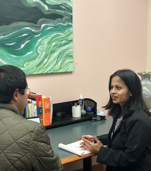 Image of Sanchaika tutoring a student